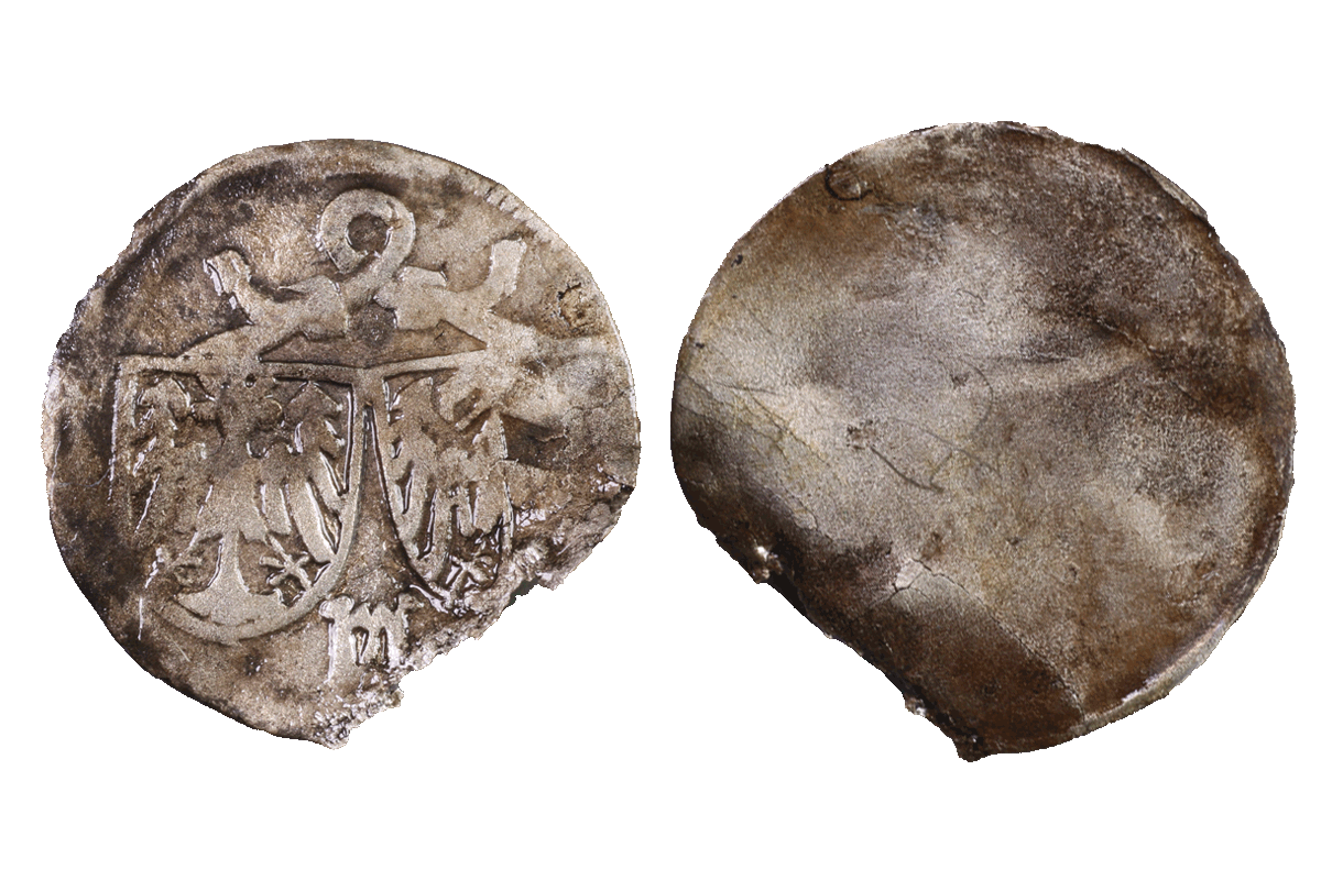 Einseitiger Pfennig aus der Stadt Nürnberg aus Silber von der Burg Bartenstein, Museum Ahler Kram, 1. Hälfte 16.Jh., Fd.-Nr. 1439, H. 1,48 cm, Br. 1,46 cm